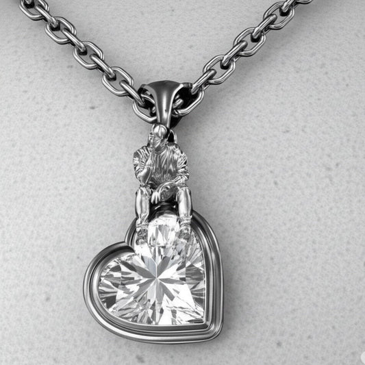 Front view of The Thinker’s Secret — 925 sterling silver heart pendant with sculptural thinker motif