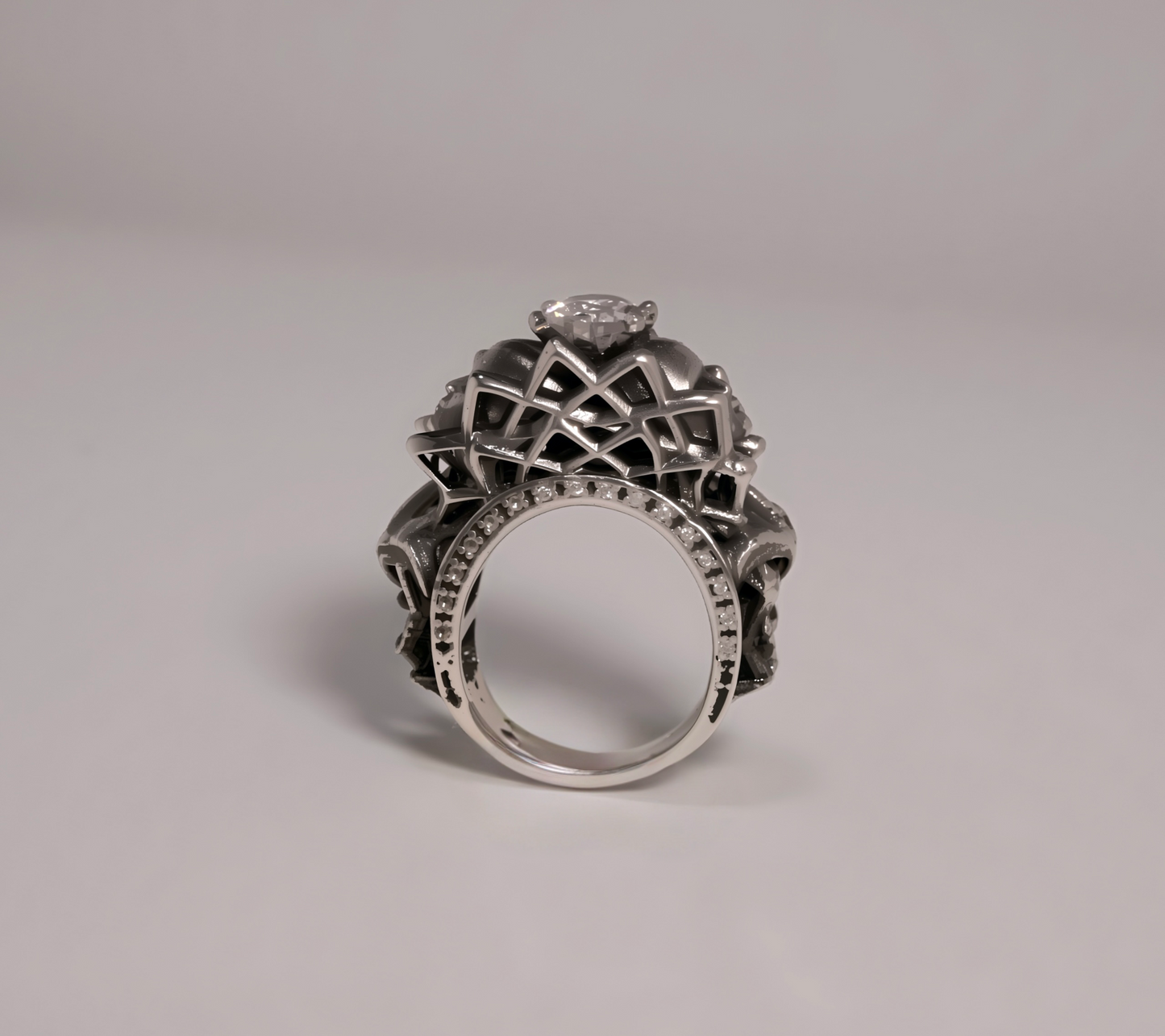 “Sculptural mandala ring in solid sterling silver 925 — angled view”
